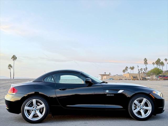 used 2011 BMW Z4 car, priced at $14,995