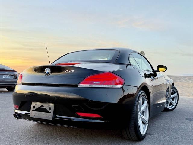 used 2011 BMW Z4 car, priced at $14,995