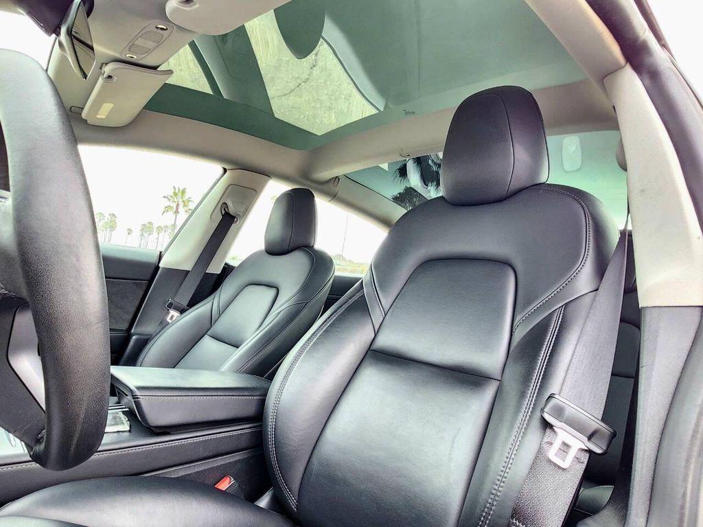 used 2023 Tesla Model 3 car, priced at $18,495