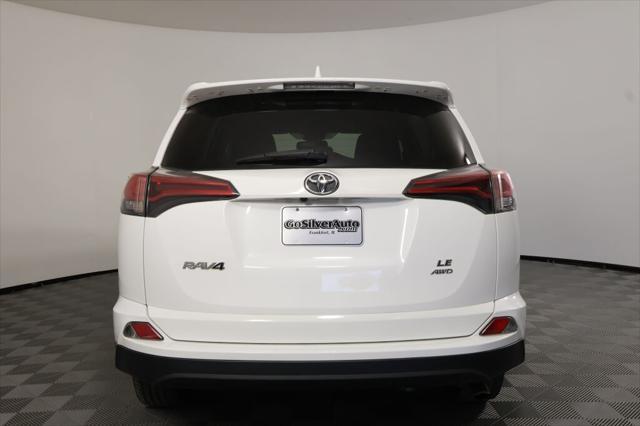 used 2018 Toyota RAV4 car, priced at $13,995