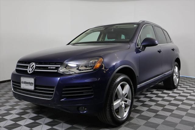 used 2011 Volkswagen Touareg Hybrid car, priced at $10,995