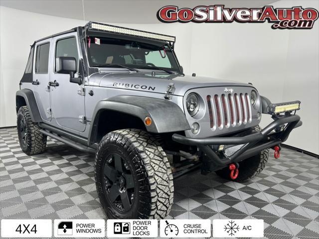 used 2014 Jeep Wrangler Unlimited car, priced at $17,795