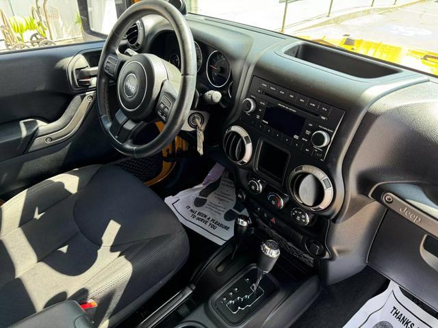 used 2014 Jeep Wrangler car, priced at $17,998