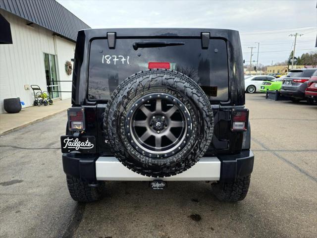 used 2012 Jeep Wrangler Unlimited car, priced at $13,900