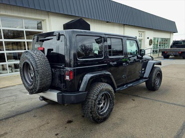 used 2012 Jeep Wrangler Unlimited car, priced at $13,900