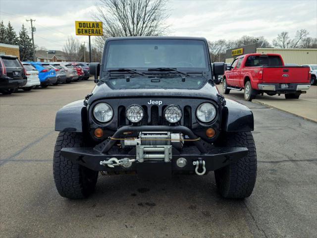 used 2012 Jeep Wrangler Unlimited car, priced at $13,900