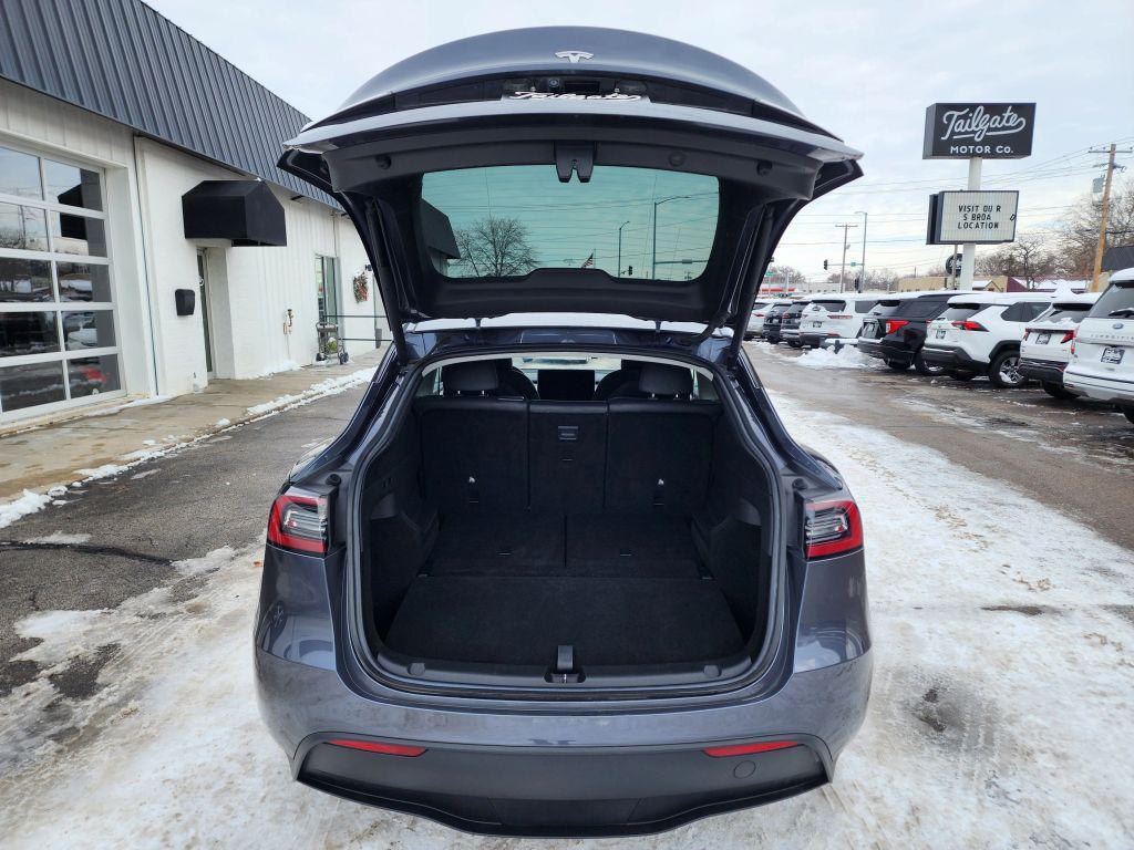 used 2023 Tesla Model Y car, priced at $27,944