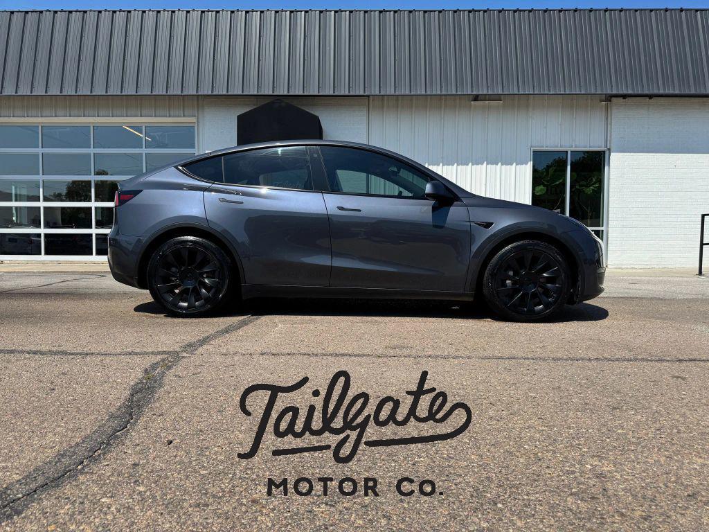 used 2023 Tesla Model Y car, priced at $27,762
