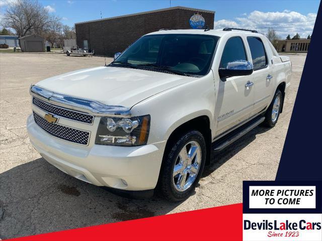 used 2013 Chevrolet Avalanche car, priced at $19,450