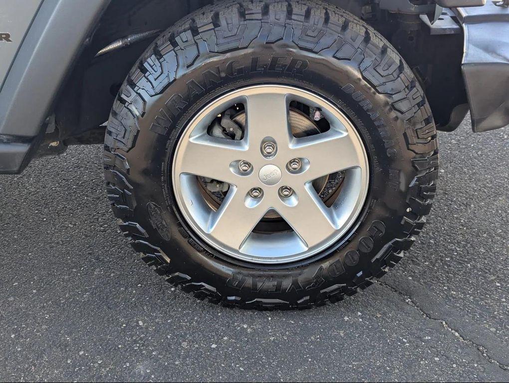 used 2014 Jeep Wrangler Unlimited car, priced at $18,477