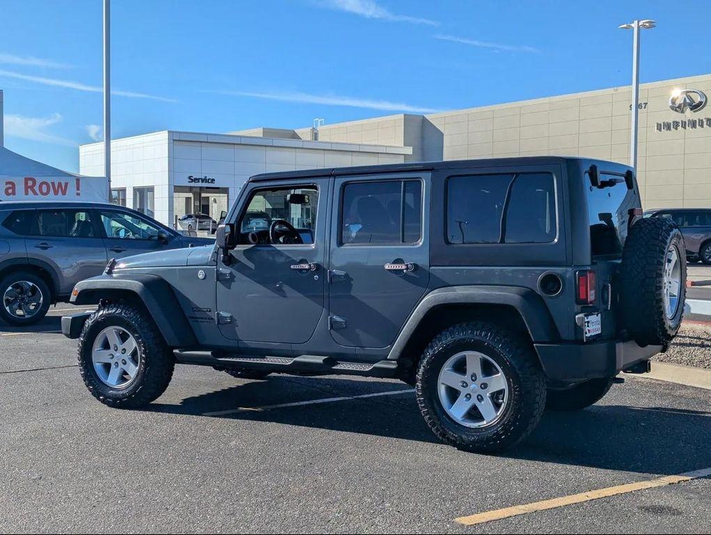 used 2014 Jeep Wrangler Unlimited car, priced at $18,477