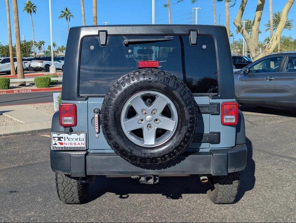 used 2014 Jeep Wrangler Unlimited car, priced at $18,477