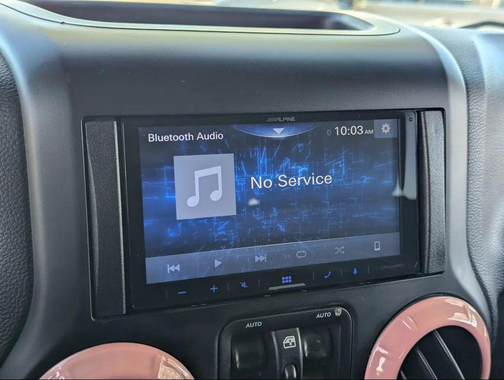 used 2014 Jeep Wrangler Unlimited car, priced at $18,477