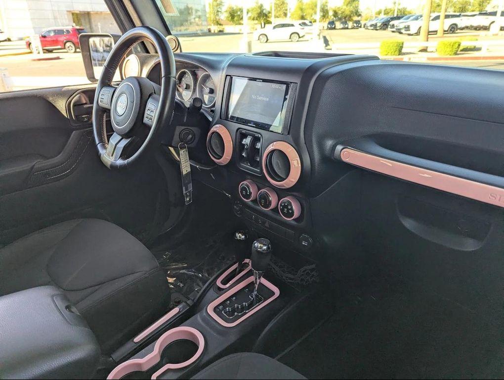 used 2014 Jeep Wrangler Unlimited car, priced at $18,477