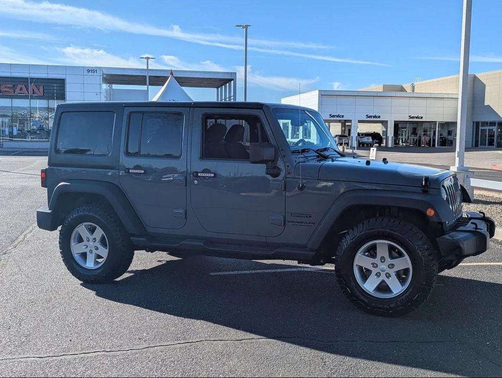 used 2014 Jeep Wrangler Unlimited car, priced at $18,477