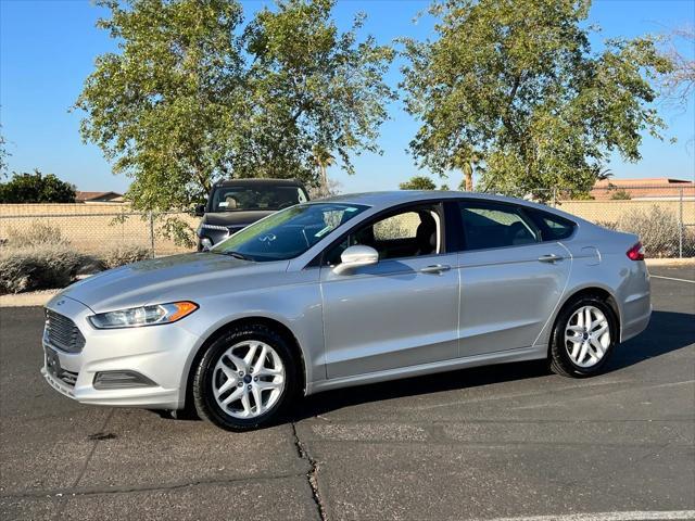 used 2014 Ford Fusion car, priced at $10,375