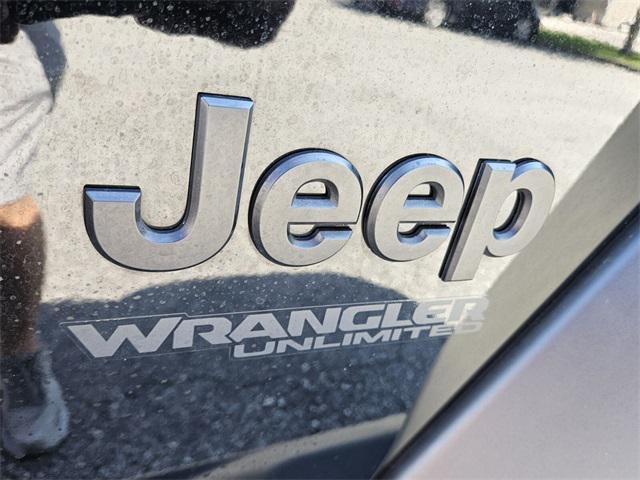 used 2021 Jeep Wrangler Unlimited car, priced at $33,995