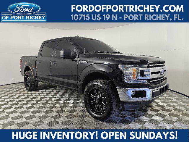 used 2019 Ford F-150 car, priced at $26,190