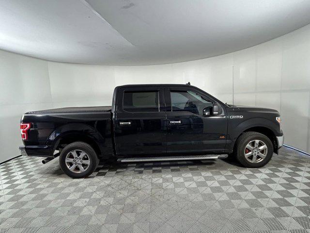 used 2018 Ford F-150 car, priced at $26,621