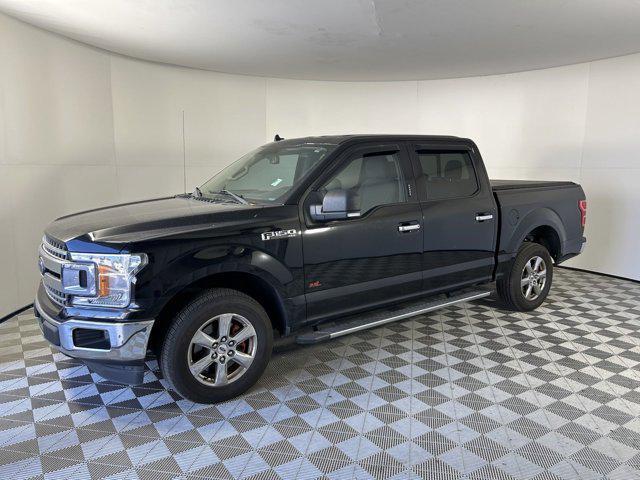 used 2018 Ford F-150 car, priced at $26,621