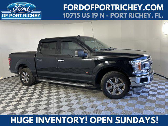 used 2018 Ford F-150 car, priced at $26,621