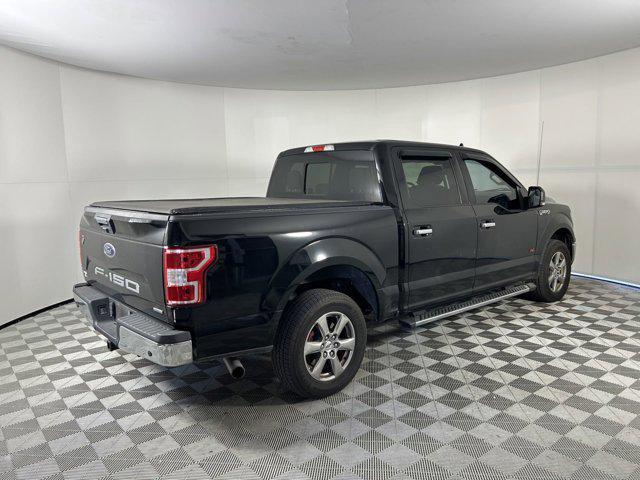 used 2018 Ford F-150 car, priced at $26,621