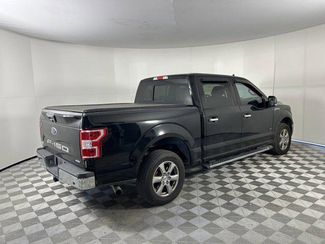 used 2018 Ford F-150 car, priced at $26,621