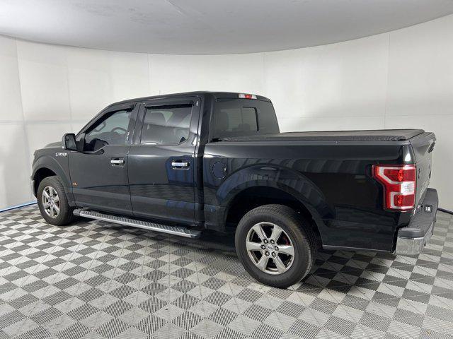 used 2018 Ford F-150 car, priced at $26,621