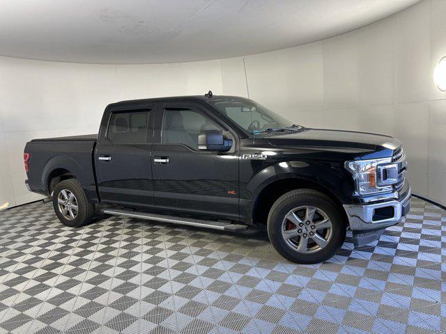 used 2018 Ford F-150 car, priced at $26,621