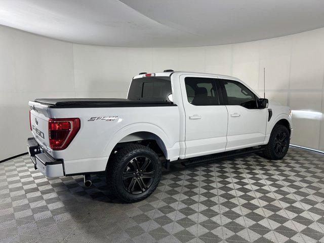 used 2021 Ford F-150 car, priced at $34,704