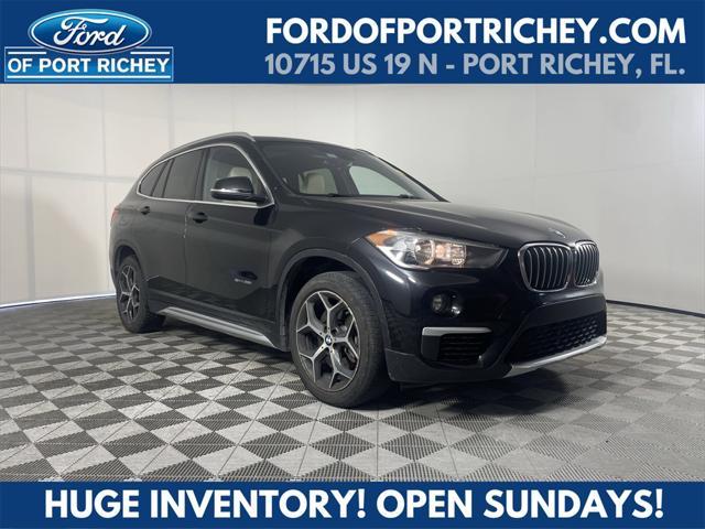 used 2018 BMW X1 car, priced at $17,141