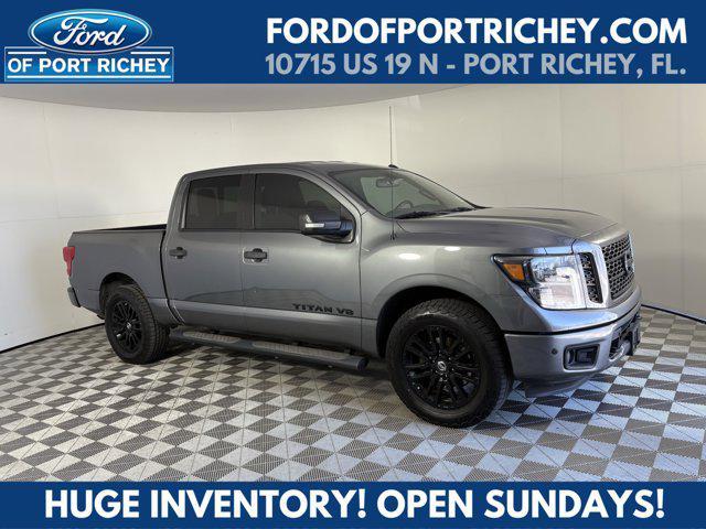 used 2019 Nissan Titan car, priced at $20,587