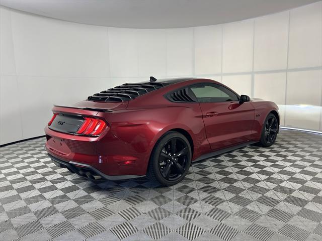 used 2021 Ford Mustang car, priced at $34,021