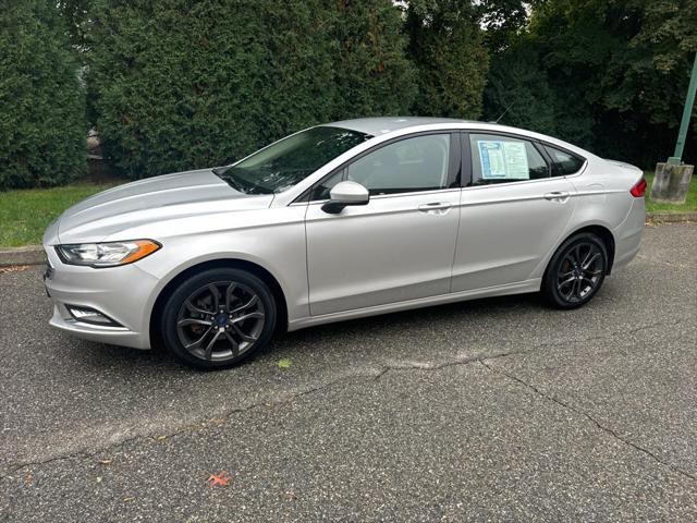 used 2018 Ford Fusion car, priced at $16,995