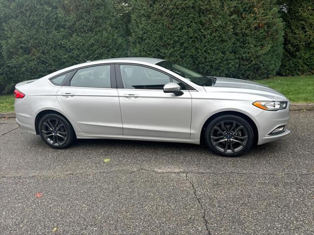 used 2018 Ford Fusion car, priced at $16,995