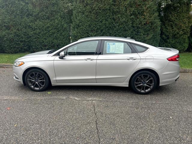 used 2018 Ford Fusion car, priced at $16,995