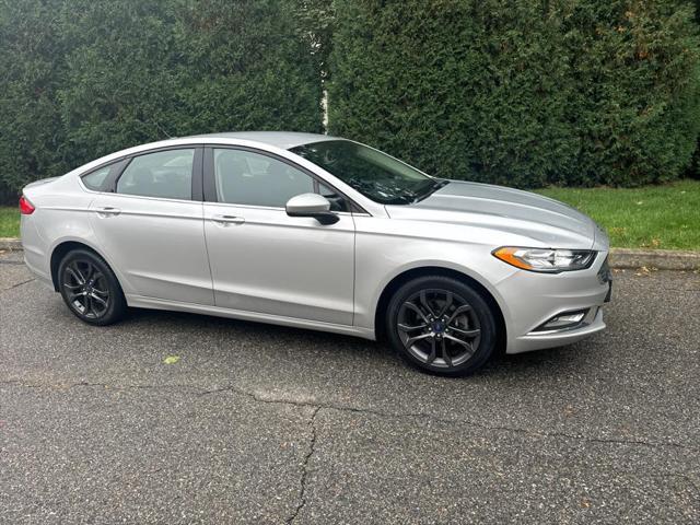 used 2018 Ford Fusion car, priced at $16,995