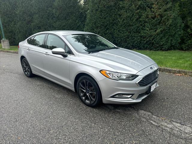 used 2018 Ford Fusion car, priced at $16,995