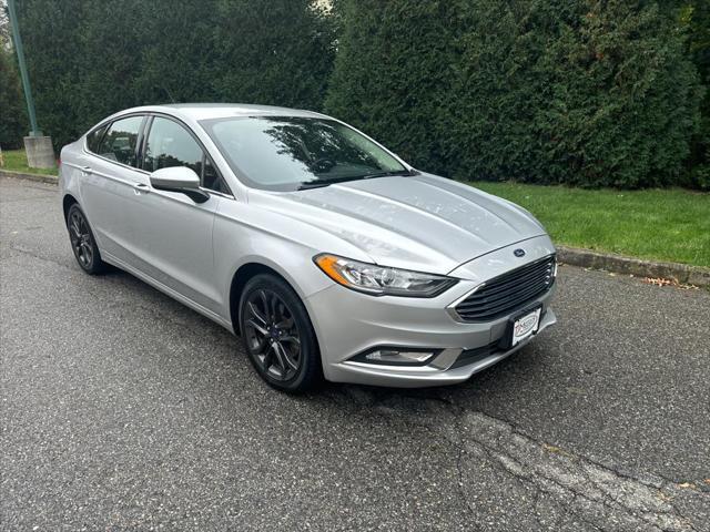 used 2018 Ford Fusion car, priced at $16,995