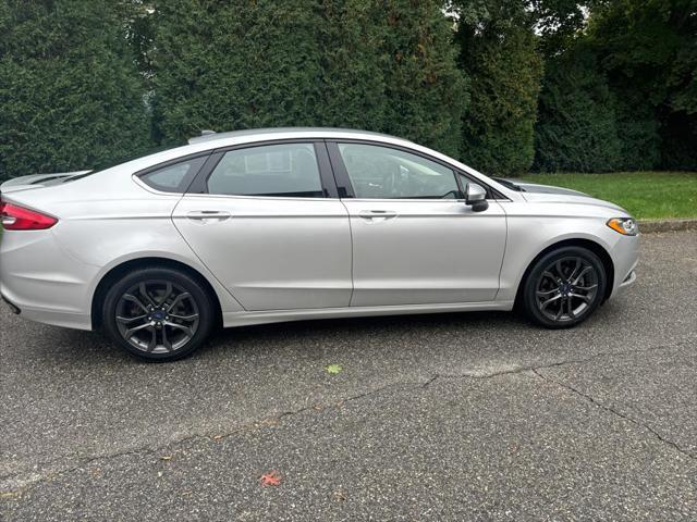 used 2018 Ford Fusion car, priced at $16,995