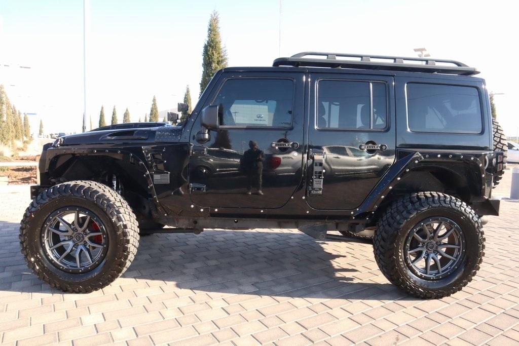 used 2014 Jeep Wrangler Unlimited car, priced at $19,778