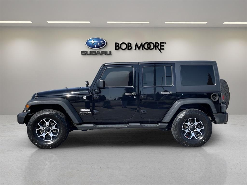 used 2013 Jeep Wrangler Unlimited car, priced at $14,005