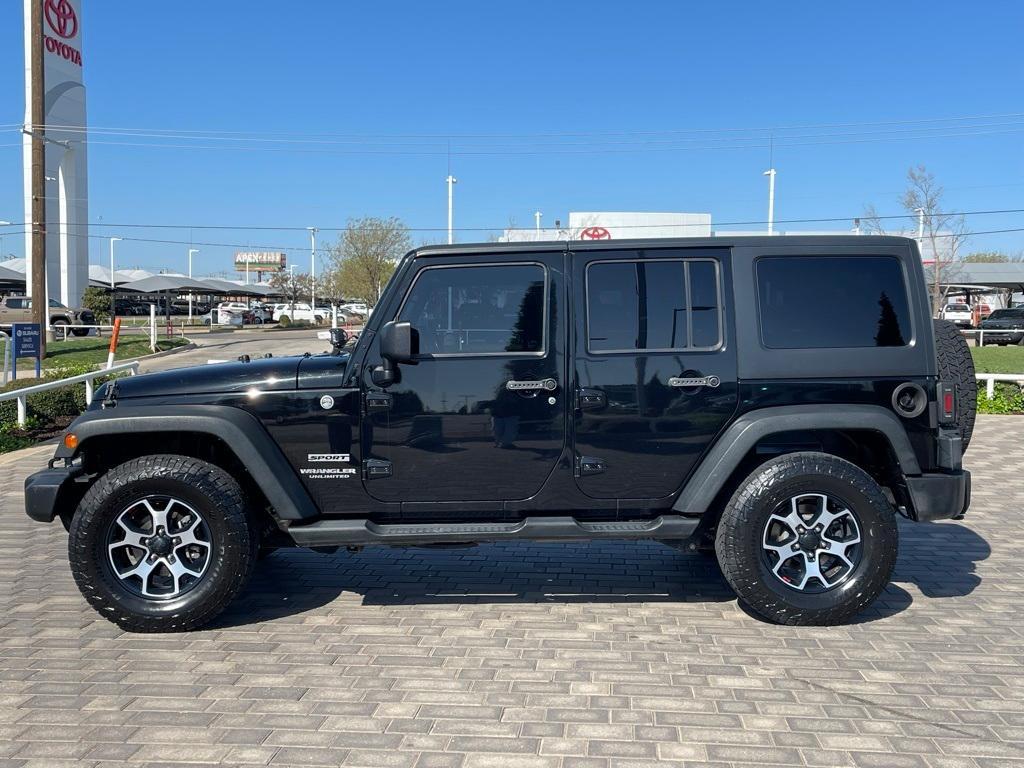 used 2013 Jeep Wrangler Unlimited car, priced at $15,988