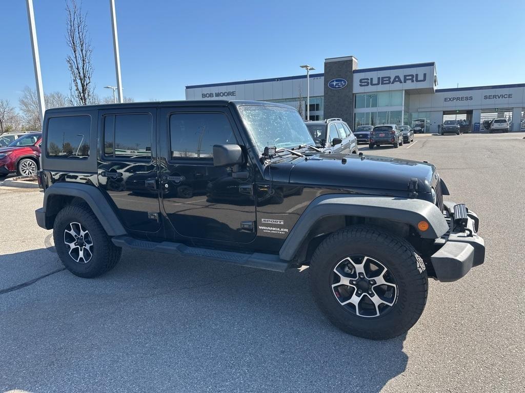 used 2013 Jeep Wrangler Unlimited car, priced at $15,988