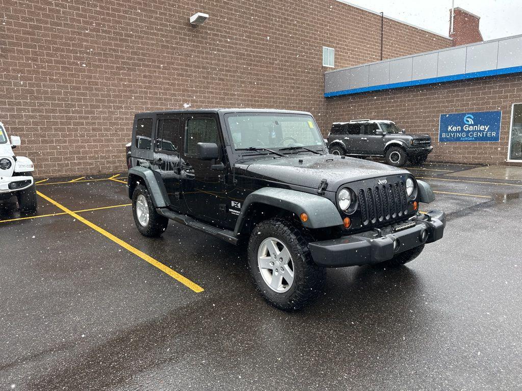used 2009 Jeep Wrangler Unlimited car, priced at $9,900