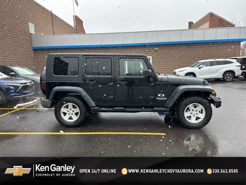 used 2009 Jeep Wrangler Unlimited car, priced at $9,900