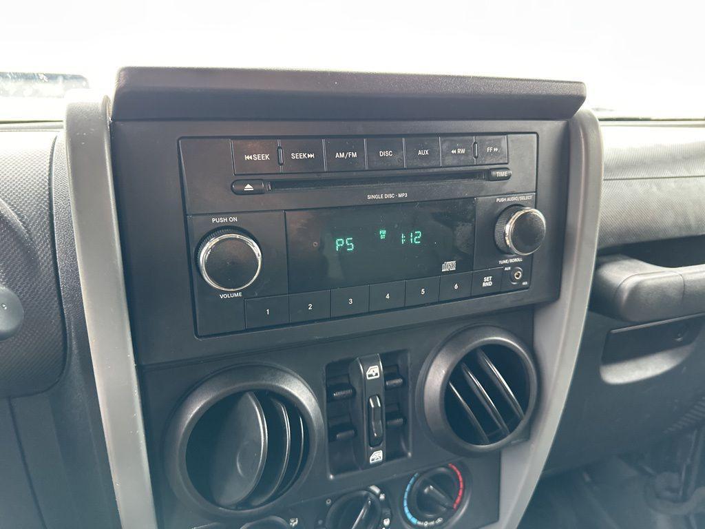 used 2009 Jeep Wrangler Unlimited car, priced at $9,900