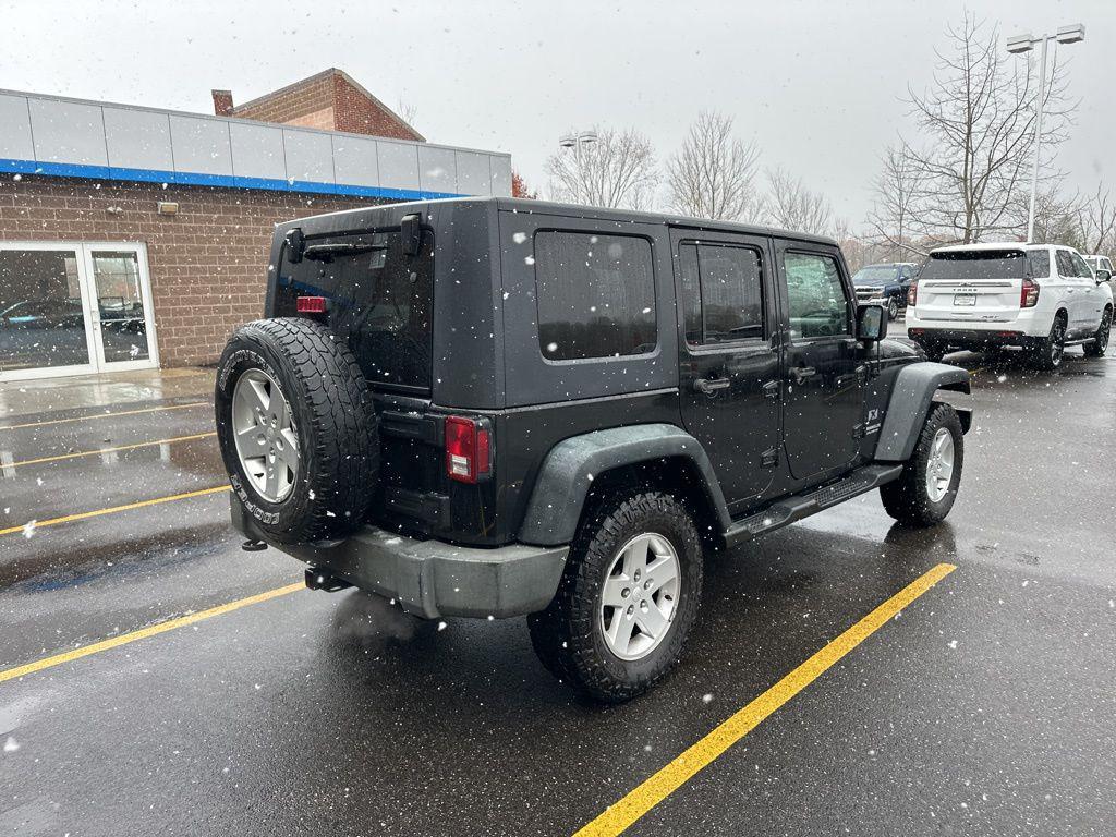 used 2009 Jeep Wrangler Unlimited car, priced at $9,900