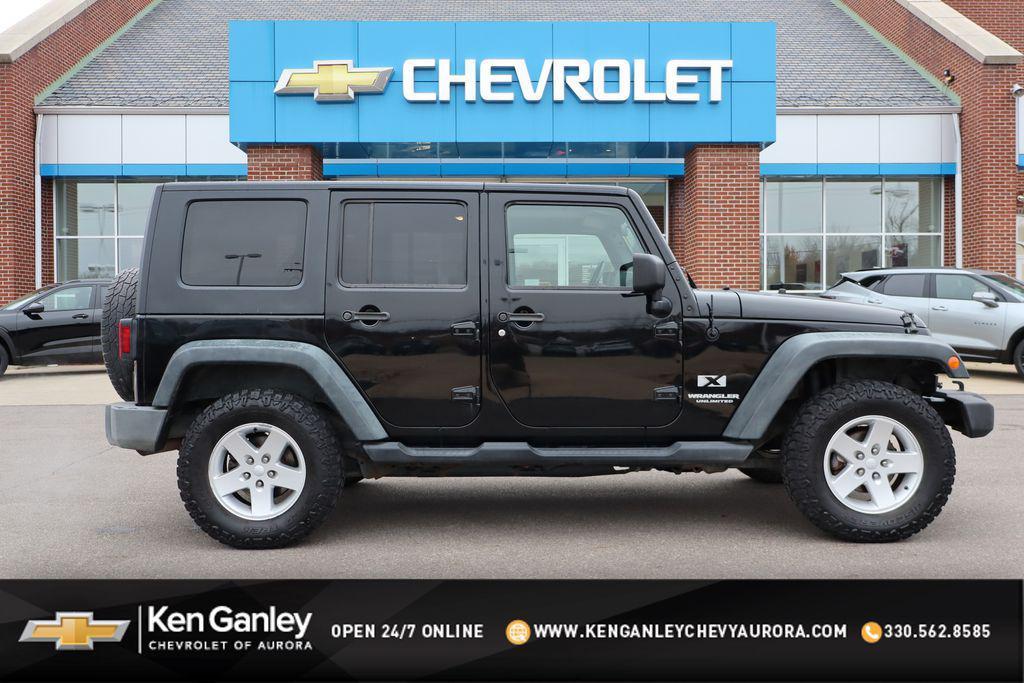 used 2009 Jeep Wrangler Unlimited car, priced at $8,500