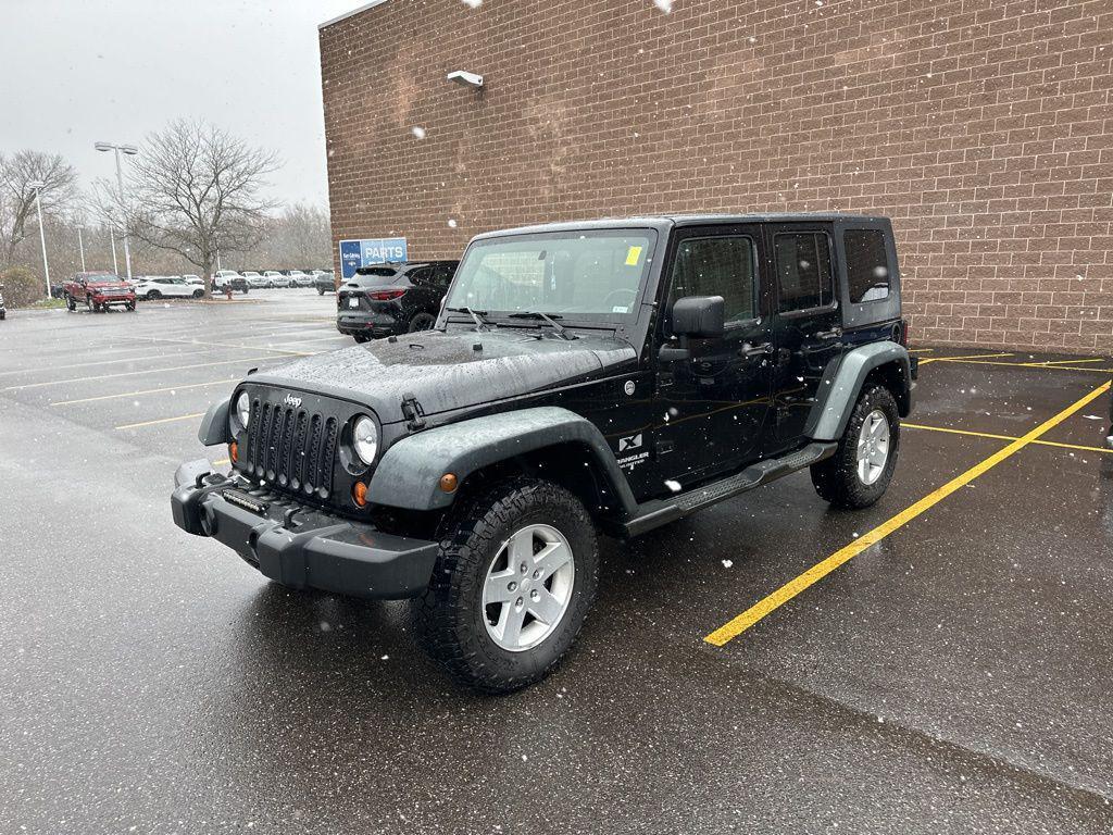 used 2009 Jeep Wrangler Unlimited car, priced at $9,900